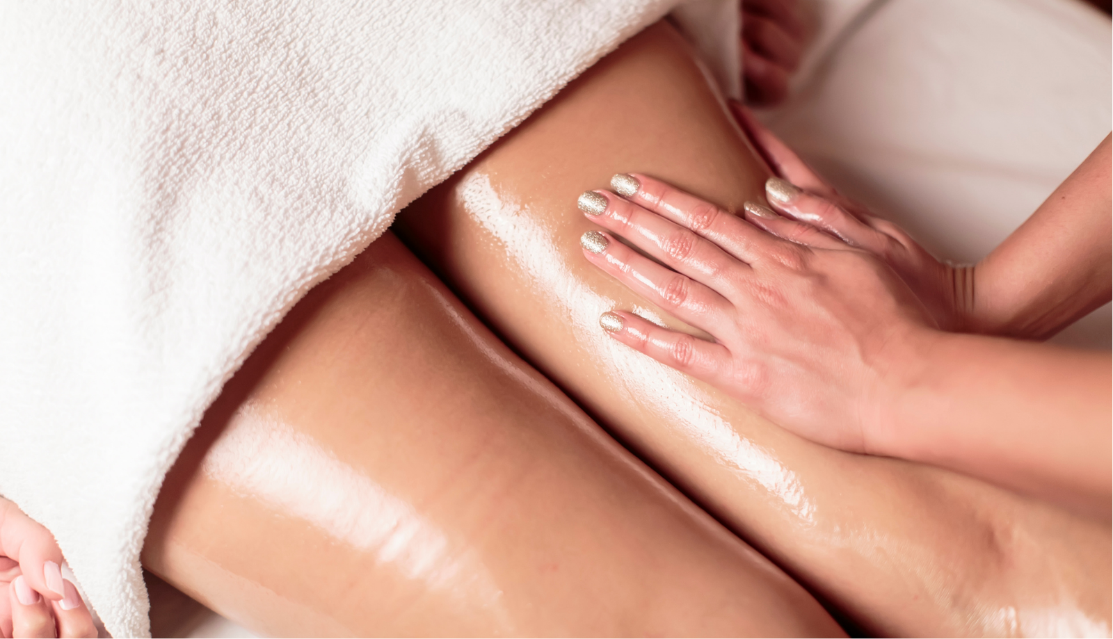 Image of a customer enjoying a relaxing massage treatment at Belle Vous Spa, Crystal Palace and Nine Elms